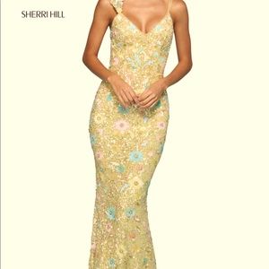 Brand new Sheri Hill prom dress. Never worn. (My daughter changed her mind)